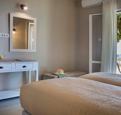 Plenty of room to get ready for the day inside the bedroom at Beachfront Suite No2, Lourdata, Kefalonia