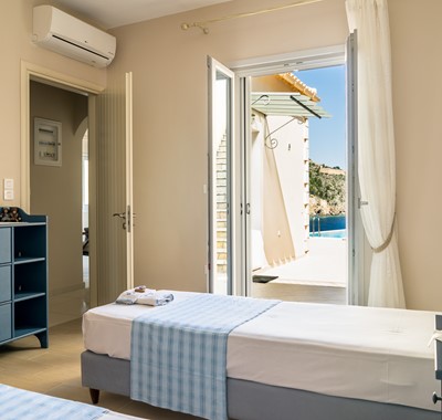 Second bedroom with views and 2 single beds inside Villa Plori, Assos, Kefalonia