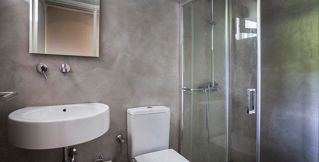 Bathroom with shower and basin inside Beachfront Suite No1, Lourdata, Kefalonia