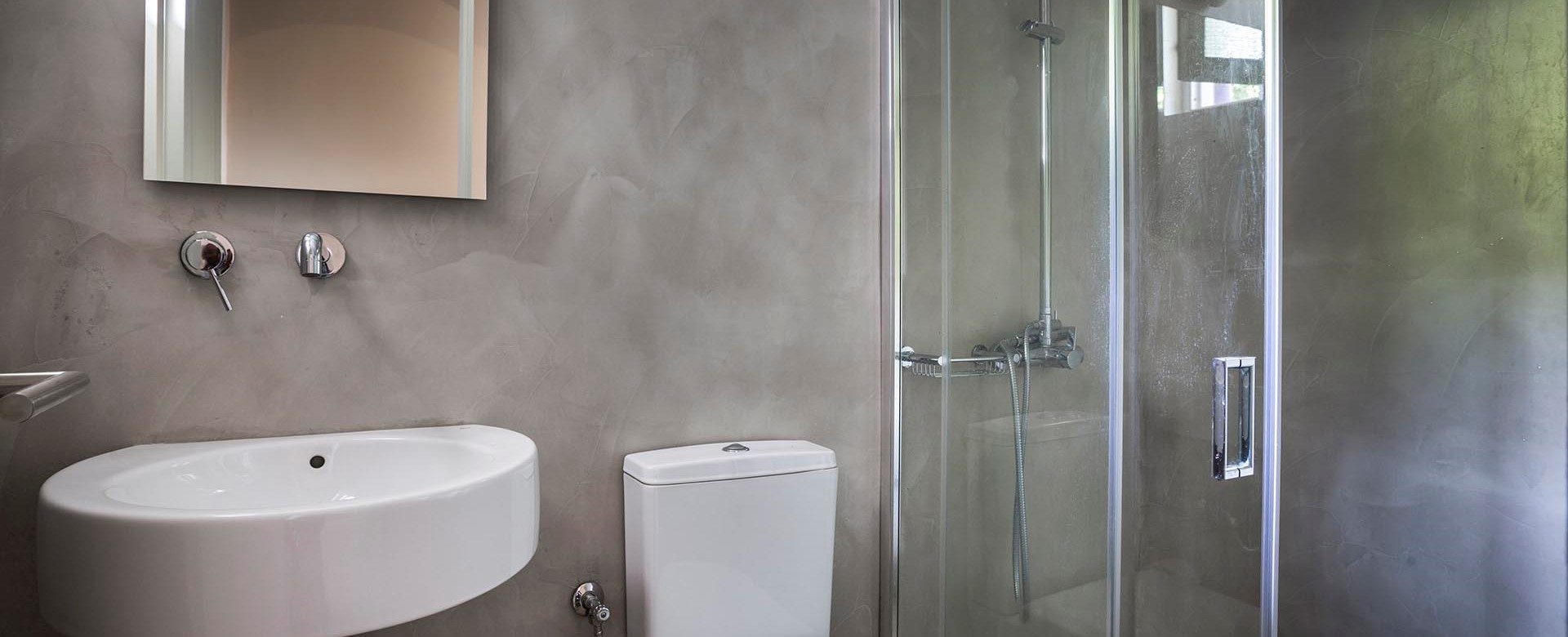 Bathroom with shower and basin inside Beachfront Suite No1, Lourdata, Kefalonia
