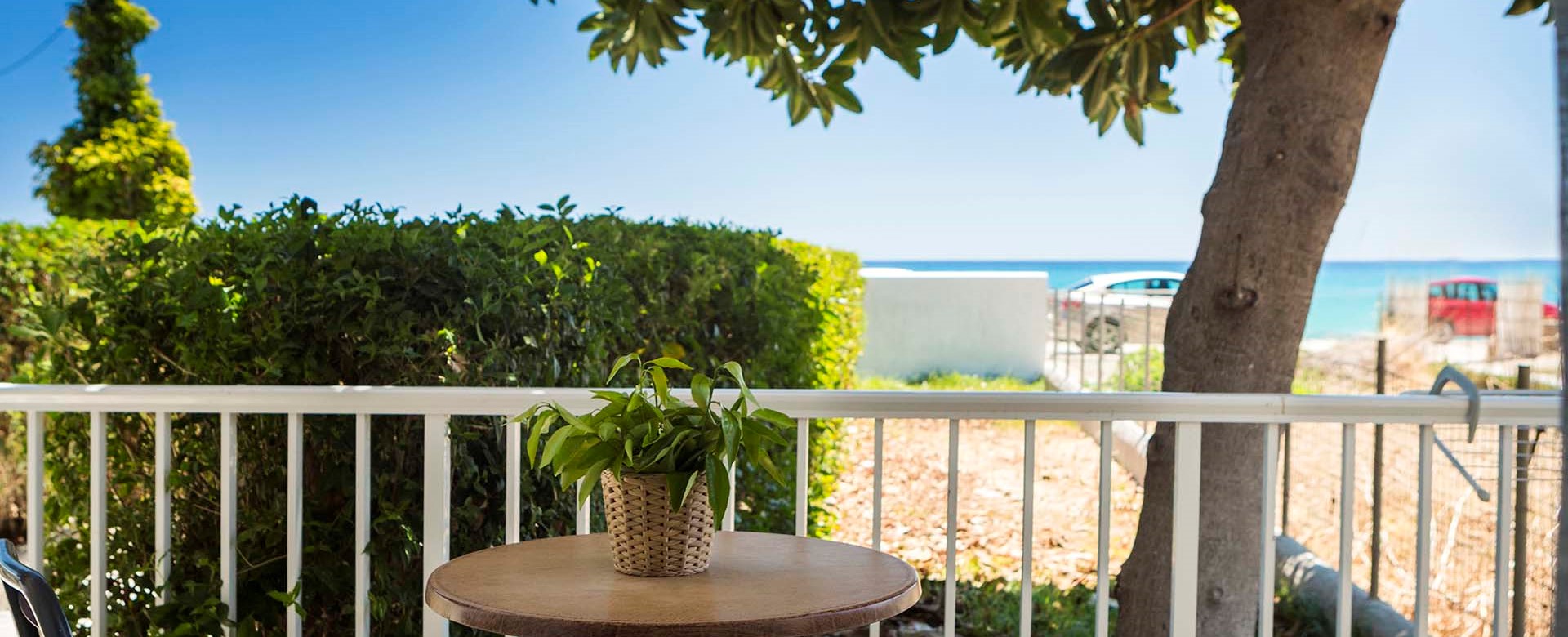 Escape the sun and drink or dine al fresco in the shade outside Beachfront Suite No1, Lourdata, Kefalonia