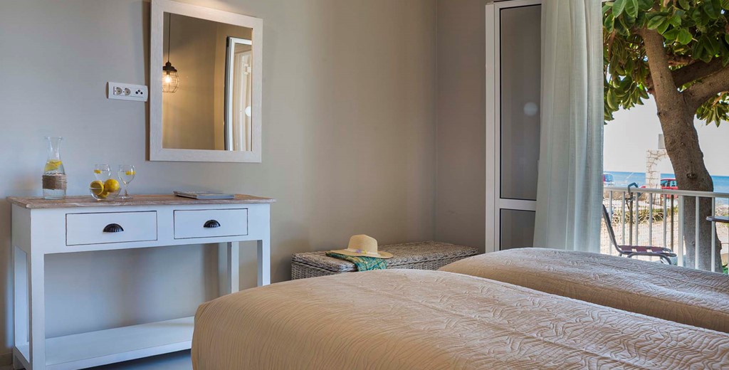 Plenty of room to get ready for the day inside the bedroom at Beachfront Suite No2, Lourdata, Kefalonia