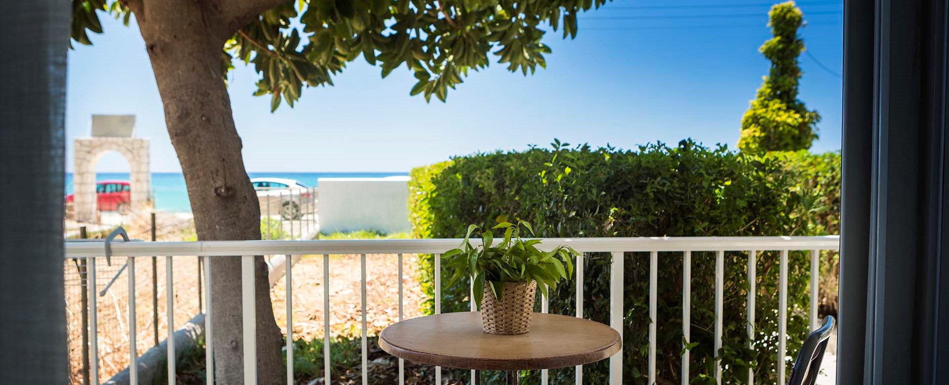 Escape the sun and drink or dine al fresco in the shade outside Beachfront Suite No2, Lourdata, Kefalonia