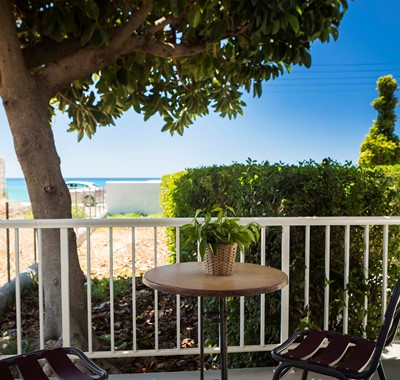 Escape the sun and drink or dine al fresco in the shade outside Beachfront Suite No2, Lourdata, Kefalonia