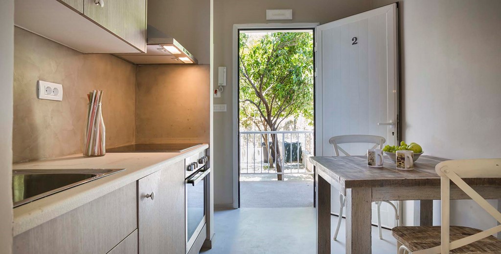 Kitchen, dining andmain entrance to Beachfront Suite No2, Lourdata, Kefalonia