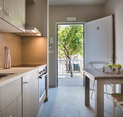 Kitchen, dining andmain entrance to Beachfront Suite No2, Lourdata, Kefalonia