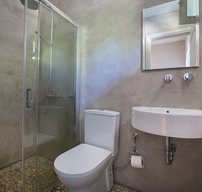Bathroom with shower and basin inside Beachfront Suite No2, Lourdata, Kefalonia