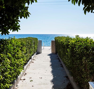 A short garden path from teh Beachfront Suites straight into the mediteranean sea at Lourdata, Kefalonia