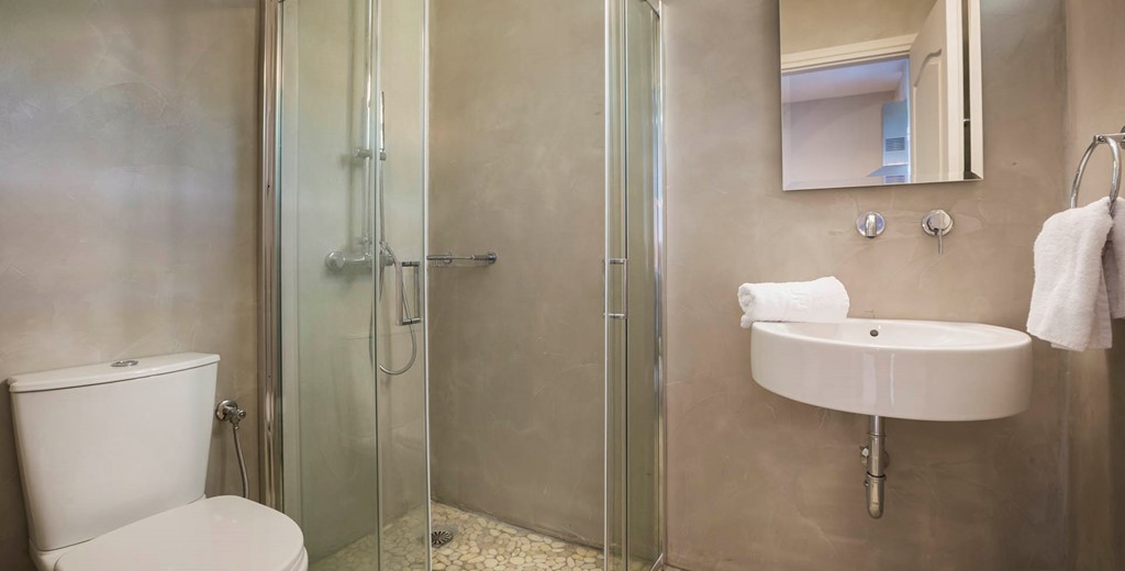 Bathroom with shower and basin inside Beachfront Suite No4, Lourdata, Kefalonia