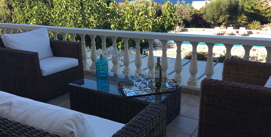 Comfortable private balcony seating outside Casa Angela, Melissani Apartments, Karavomilos, Kefalonia, Greek Islands