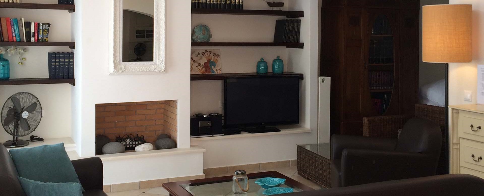Comfortable leather lounge space inside Casa Angela, Melissani Apartments, Karavomilos, Kefalonia, Greek Islands