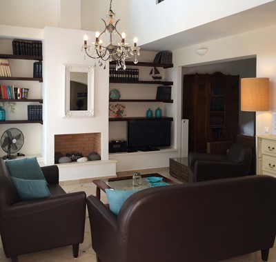 Comfortable leather lounge space inside Casa Angela, Melissani Apartments, Karavomilos, Kefalonia, Greek Islands