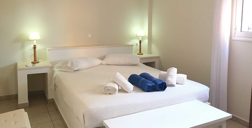 Bedroom with double bed inside Casa Elena, Melissani Apartments, Karavomilos, Kefalonia, Greek Islands