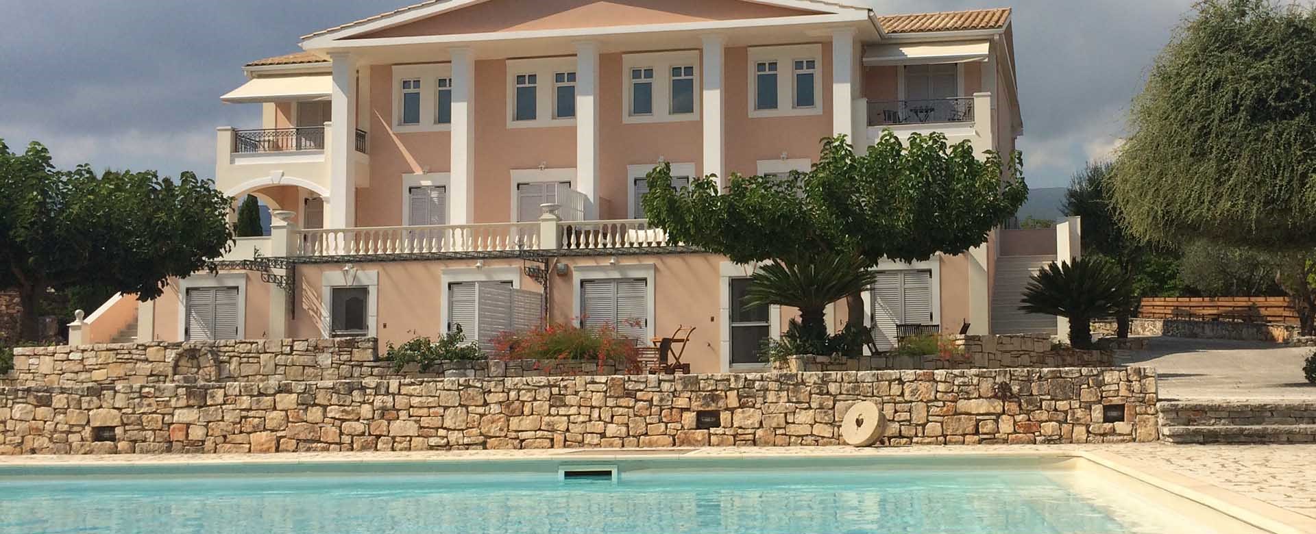 The pool and impressive Melissani Apartments in Karavomilos, Kefalonia, Greek Islands