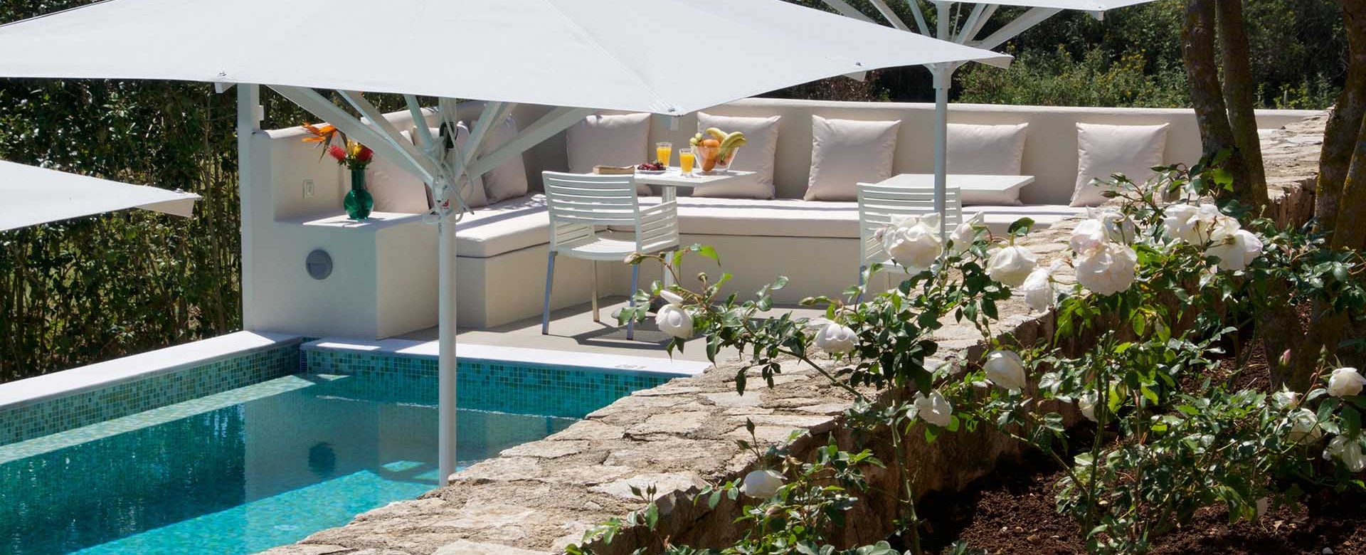 Gardens and outside seating at Magnolia Apartments, Fiscardo, Kefalonia, Greek Islands