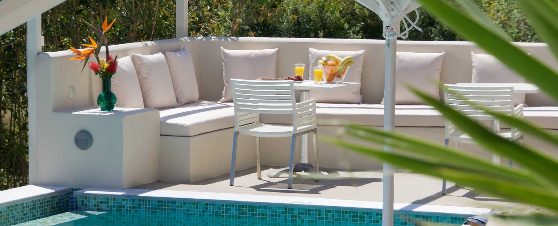 Chill and eat lunch by the pool outside Magnolia Apartments, Fiscardo, Kefalonia, Greek Islands