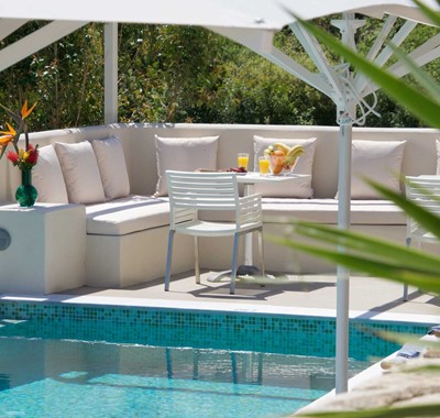 Chill and eat lunch by the pool outside Magnolia Apartments, Fiscardo, Kefalonia, Greek Islands