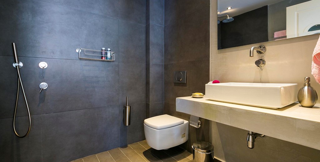 Wet room bathroom with basin and shower inside Thalassa House, Assos, Kefalonia, Greek Islands