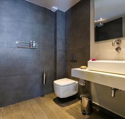 Wet room bathroom with basin and shower inside Thalassa House, Assos, Kefalonia, Greek Islands