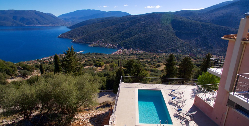 Aerial view showing the pool and Villa Amore looking down to the coast and hills in Agia Efimia, Kefalonia, Greek Islands