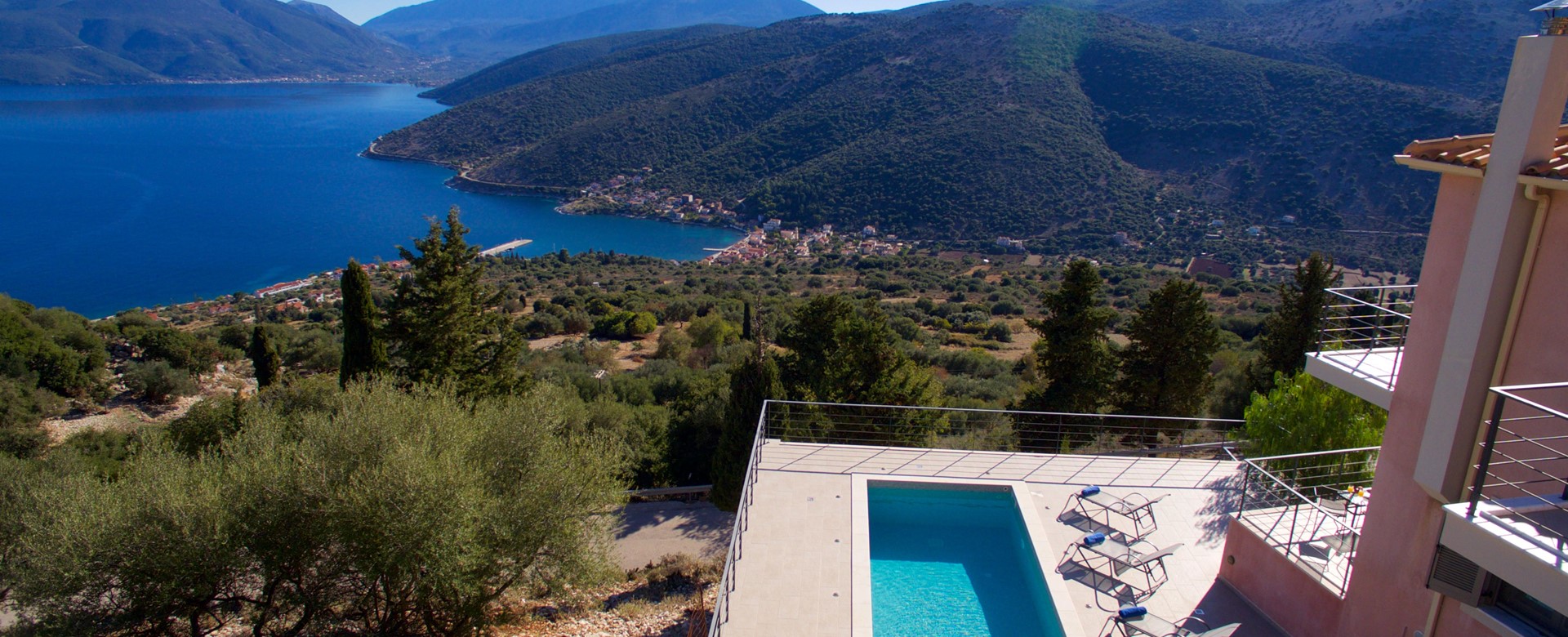 Aerial view showing the pool and Villa Amore looking down to the coast and hills in Agia Efimia, Kefalonia, Greek Islands