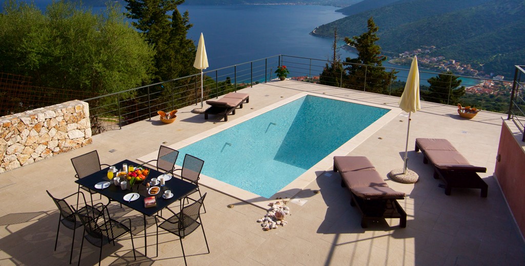 Outside dining, pool, sun beds and views outside Villa Amore, Agia Efimia, Kefalonia, Greek Islands