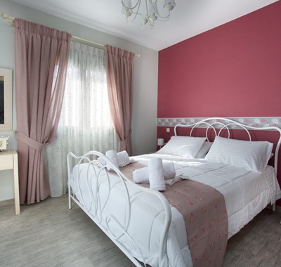 Master bedroom with large double bed inside Villa Amore, Agia Efimia, Kefalonia, Greek Islands