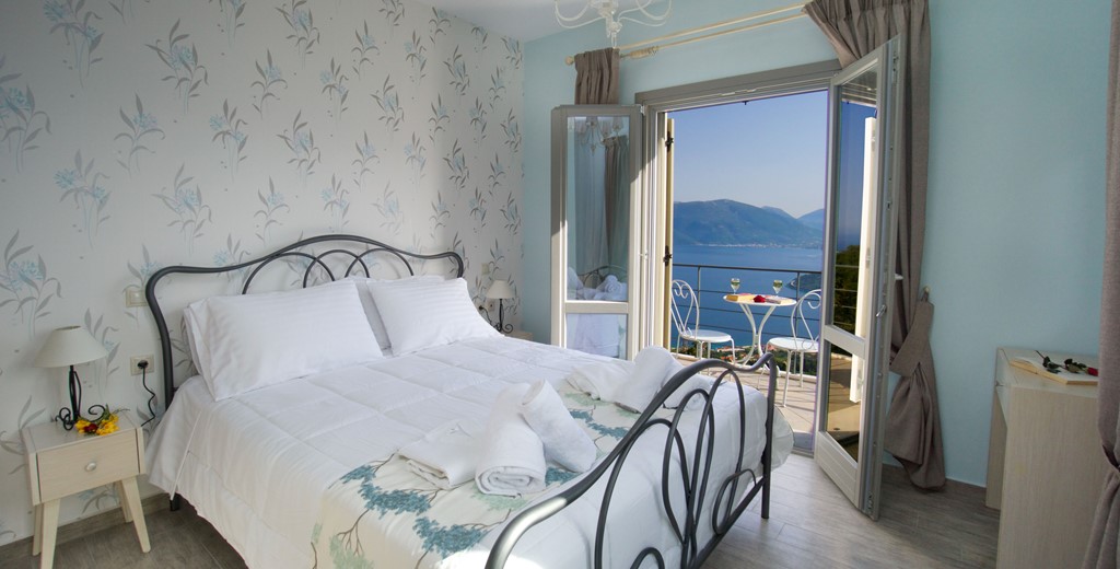 Bedroom with double bed, private balcony and stunning views from Villa Amore, Agia Efimia, Kefalonia, Greek Islands