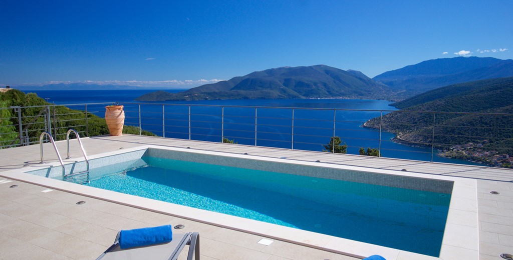 Sunbeds the pool and an incredible view from Villa Aurora, Agia Efimia, Kefalonia, Greek Islands