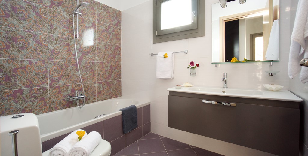 Shower over bath and basin in one of the bathrooms inside Villa Aurora, Agia Efimia, Kefalonia, Greek Islands