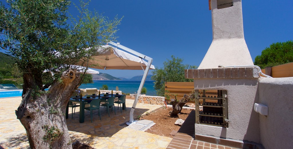 Oven and shaded al fresco dining space outside Villa Frydi, Karavomilos, Kefalonia, Greek Islands