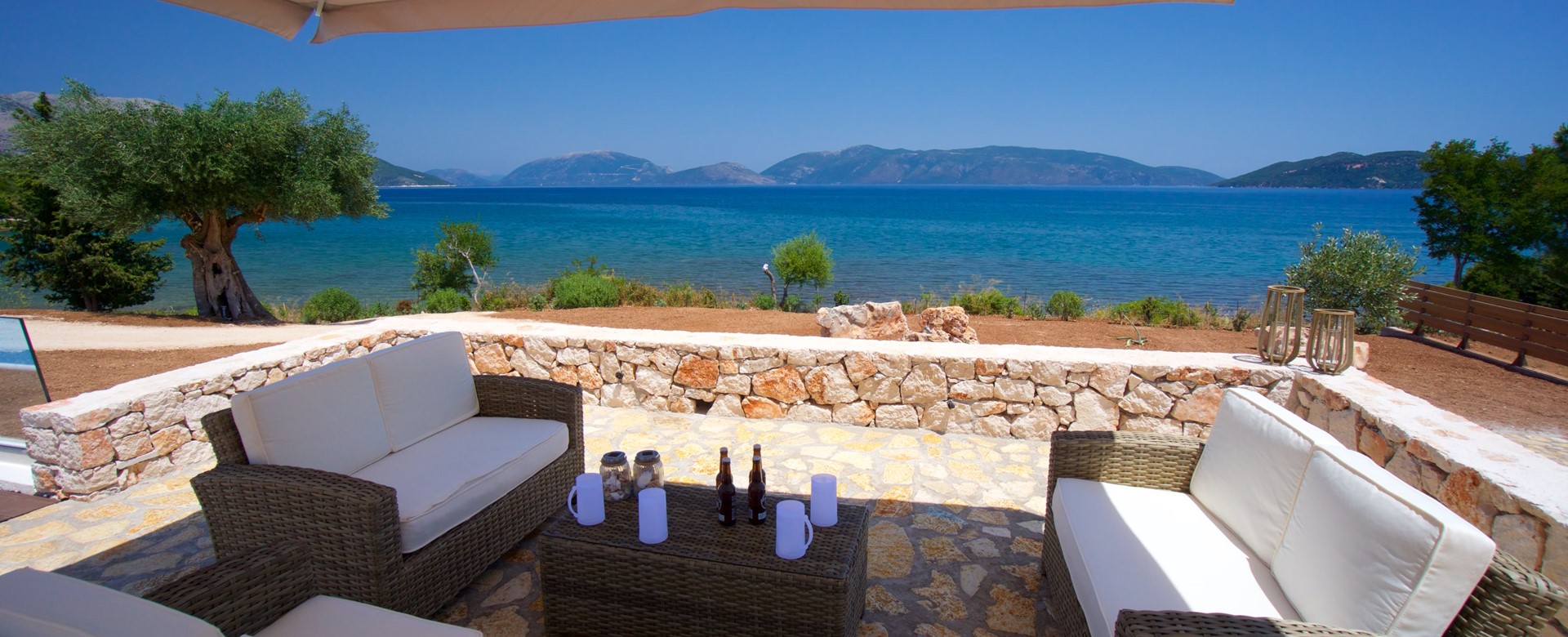 Enjoy a coffee in the shade during your holiday at Villa Frydi, Karavomilos, Kefalonia, Greek Islands