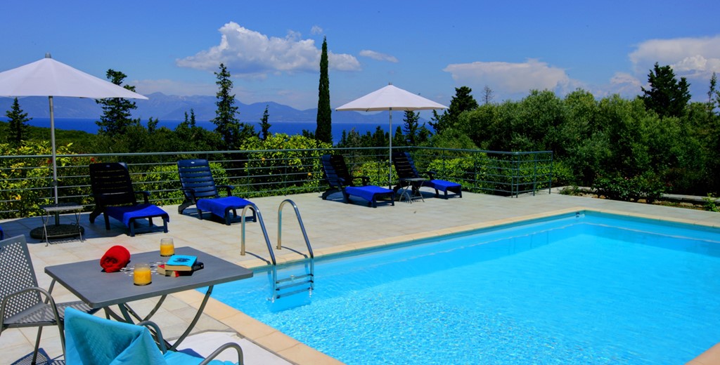 Relax poolside with umbrellas and loungers at Villa Gaeta Fiscardo, Kefalonia, Greek Islands