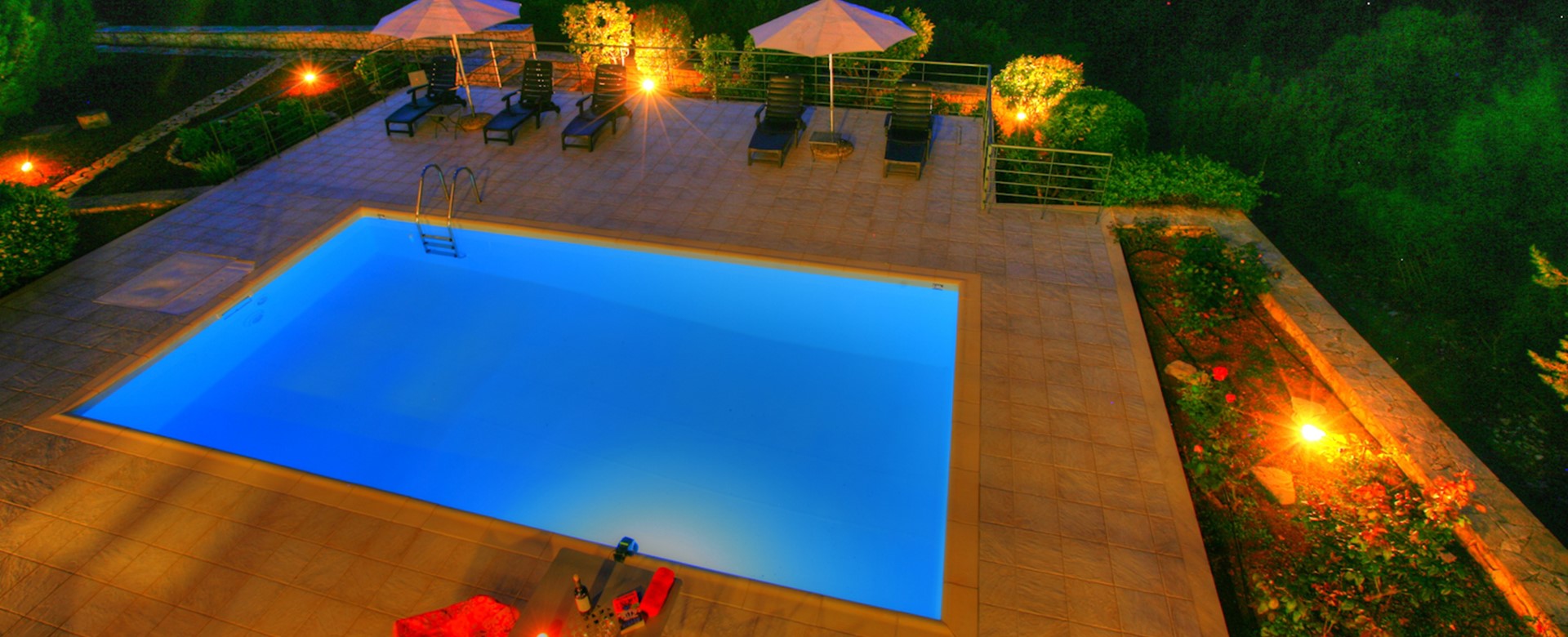 Aerial view of private pool at sundown at Villa Gaeta Fiscardo, Kefalonia, Greek Islands