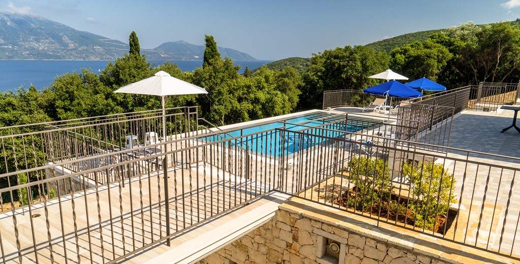 View across bridge to large private pool at Villa Gionis Fiscardo, Kefalonia, Greek Islands