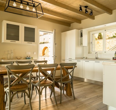 Modern, fully equipped kitchen diner at Villa Gionis Fiscardo, Kefalonia, Greek Islands