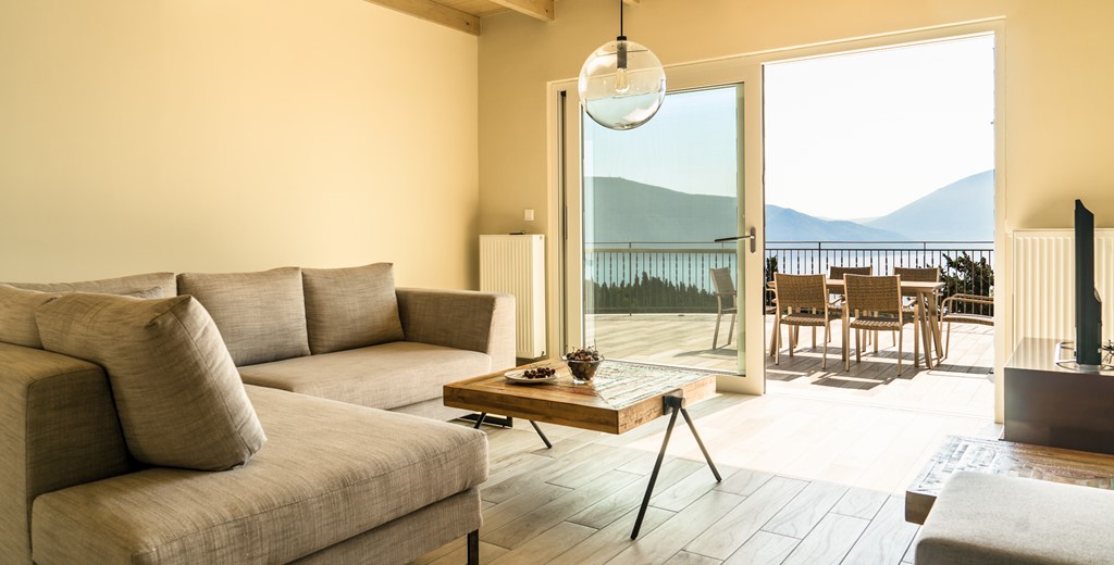 Contemporary lounge with views over large terrace at Villa Gionis Fiscardo, Kefalonia, Greek Islands