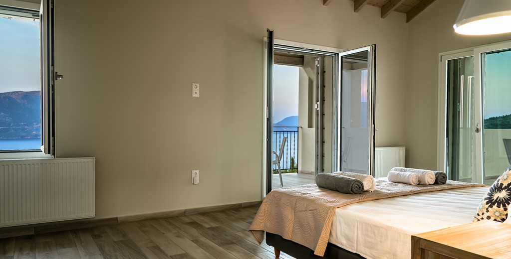 Stunning mountain and sea views from bed at Villa Gionis Fiscardo, Kefalonia, Greek Islands