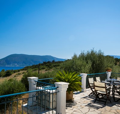 Enjoy eating outside with stunning views across the sea and mountains at Villa Lithia, Fiscardo, Kefalonia, Greek Islands