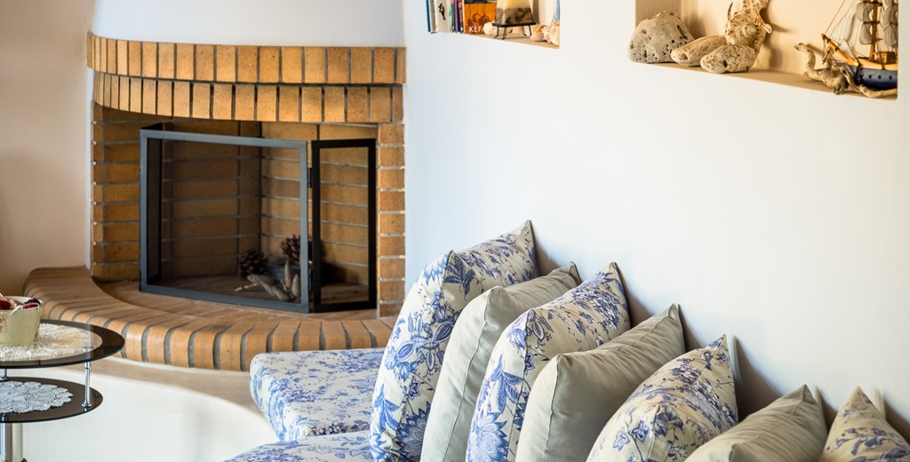 Charismatic fireplace in lounge area at Villa Petrino, Assos, Kefalonia, Greek Islands