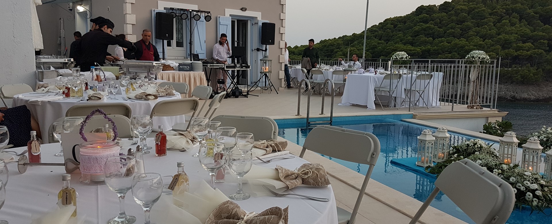 Preparing for the party, DJ, flowers and dining outside at Villa Plori, Assos, Kefalonia