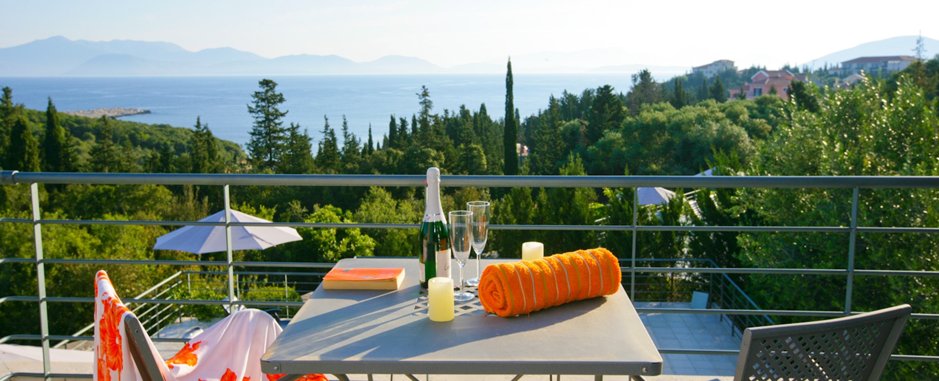 Beautiful views across pool towards the sea and mountains at Villa Roberto, Fiscardo, Kefalonia, Greek Islands