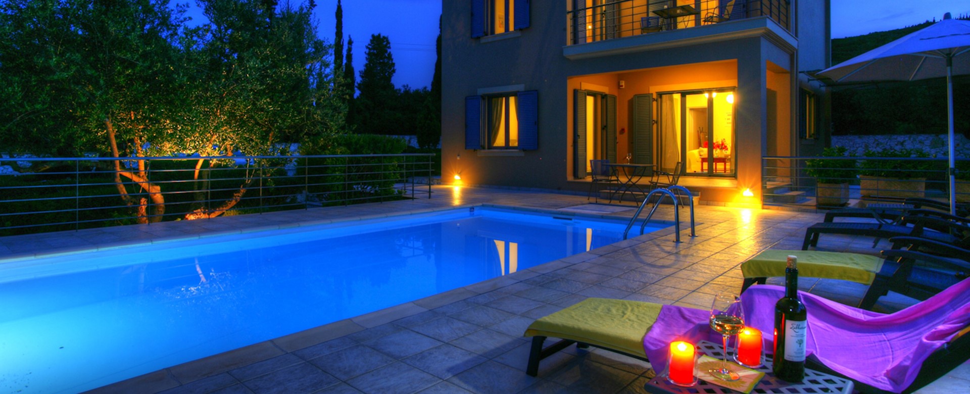 Relax poolside soaking up the calm atmosphere with an evening drink at Villa Roberto, Fiscardo, Kefalonia, Greek Islands