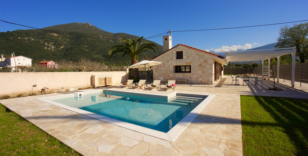 Spacious private pool with loungers and shaded terrace at Villa Theano, Sami, Kefalonia, Greek Islands