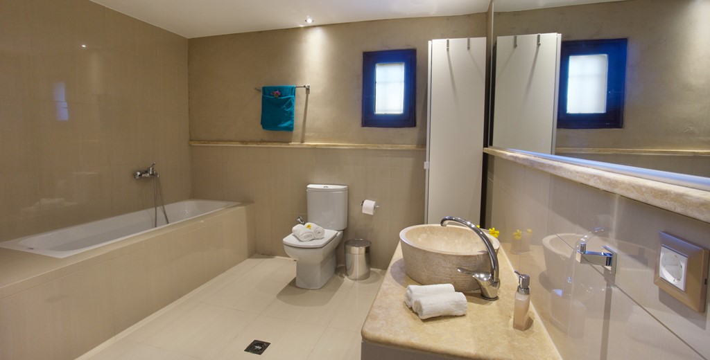 Spacious modern bathroom with shower over bath at Villa Theano, Sami, Kefalonia, Greek Islands