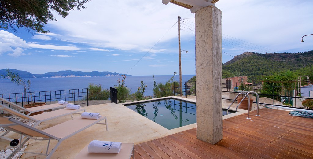 Decked veranda with pool and views out to the Mediteranean at Villa Vivere, Assos, Kefalonia