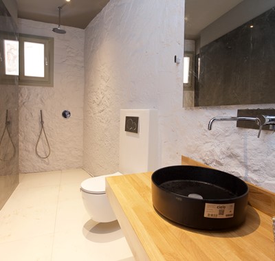 A bathroom with shower inside Villa Vivere, Assos, Kefalonia