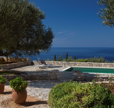 Pool, garden and sea views outside Lemoni Cottage, Fiscardo, Kefalonia