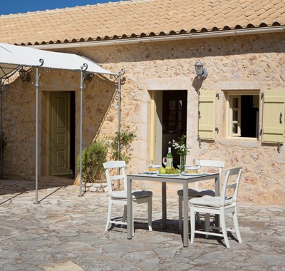 Afternoon fruit and wine closer to the cottage outside Lemoni Cottage, Fiscardo, Kefalonia