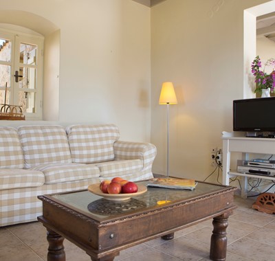 The lounge and sofa area inside Lemoni Cottage, Fiscardo, Kefalonia